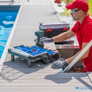 Pool service provider working in Southlake Texas on a pool filter system.